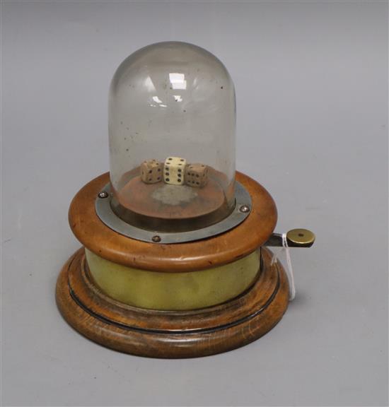 A rare Victorian dice shaker with original glass dome
